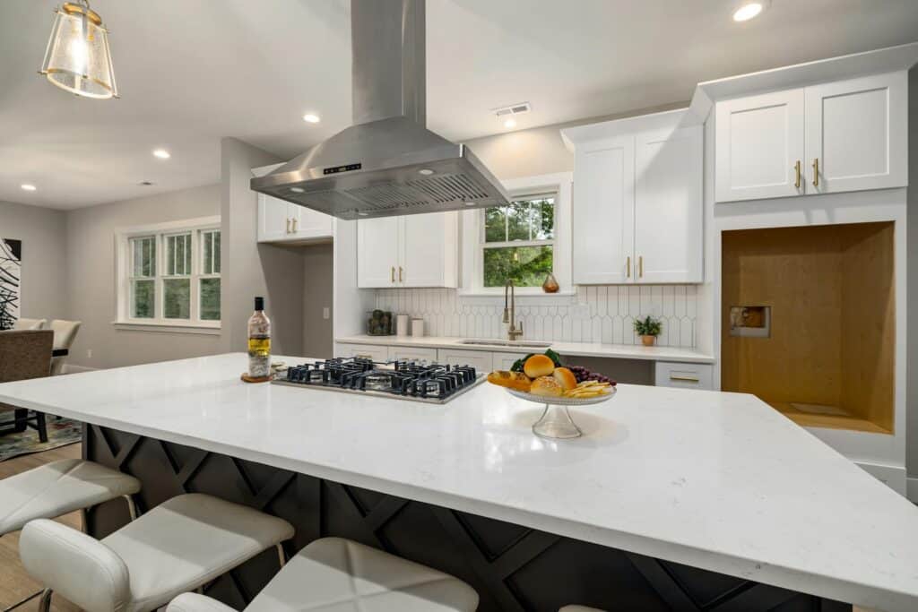 How Does a High-Quality Range Hood Protect Your Cabinets From Buildup?